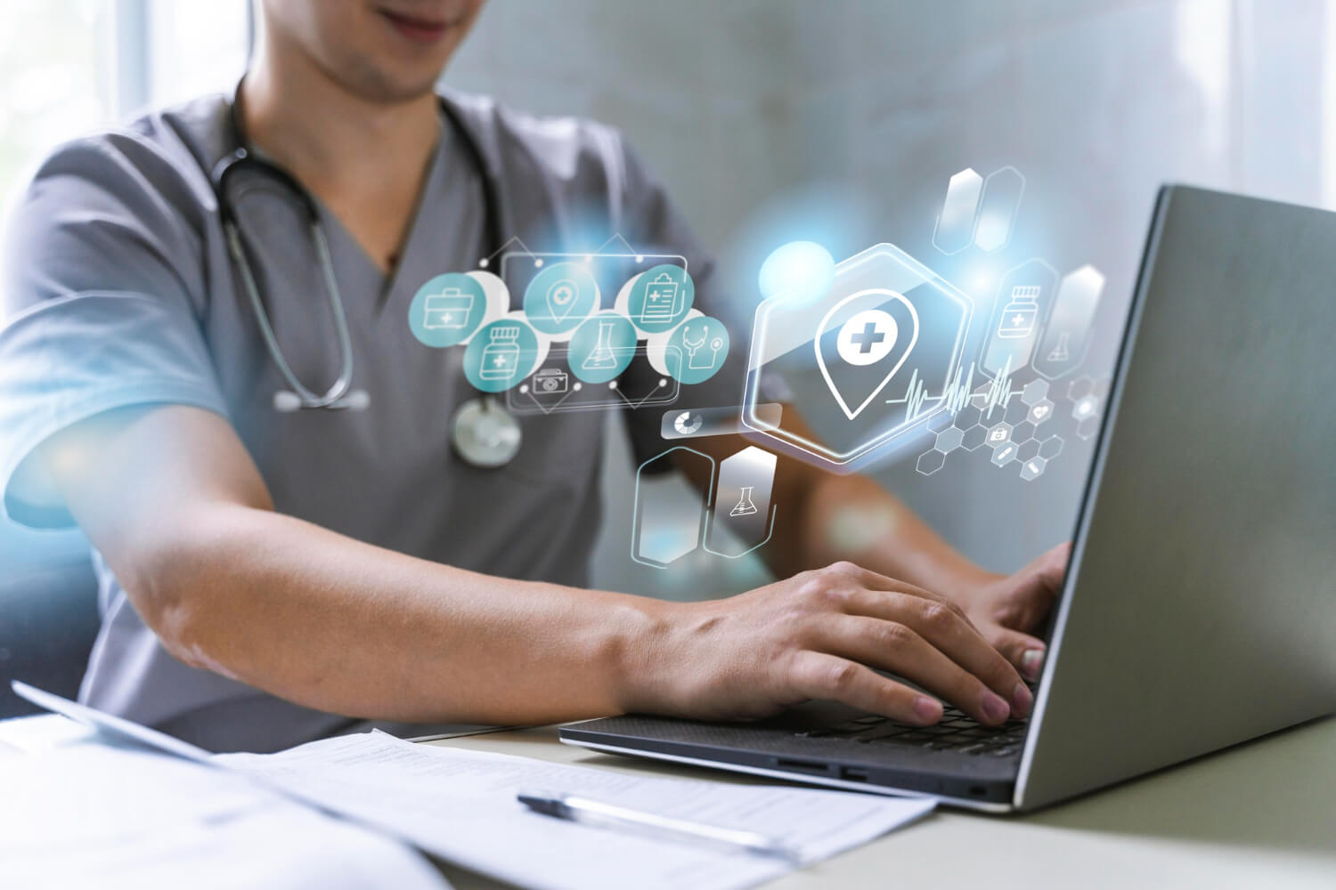 Healthcare professional using a laptop with digital medical icons representing telemedicine, electronic health records, and modern healthcare technology